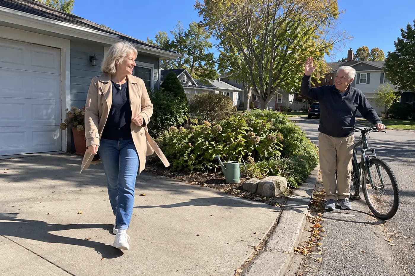 Older woman starting a walk at an easy pace on her residential street.
